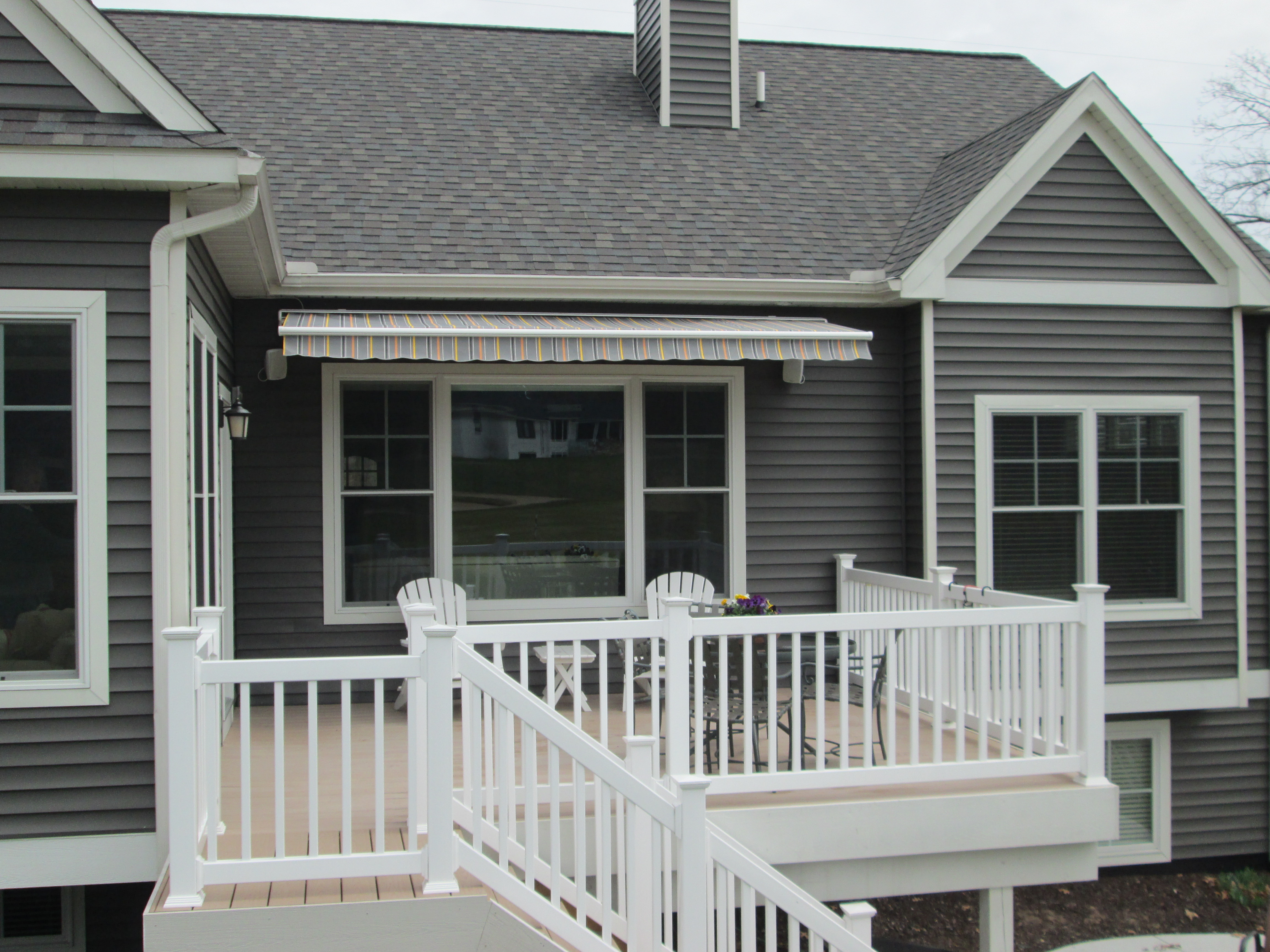 HOME retractable  deck  awnings  19 Muskegon Awning  